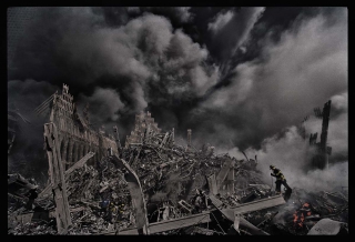 Firefighters search for survivors at Ground Zero.